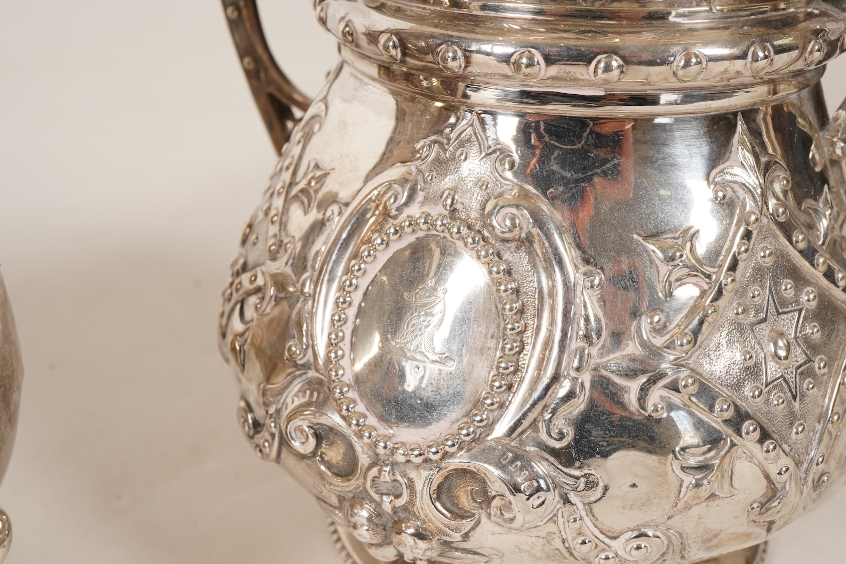 A Victorian ornate silver four piece tea and coffee service, by Thomas Smily